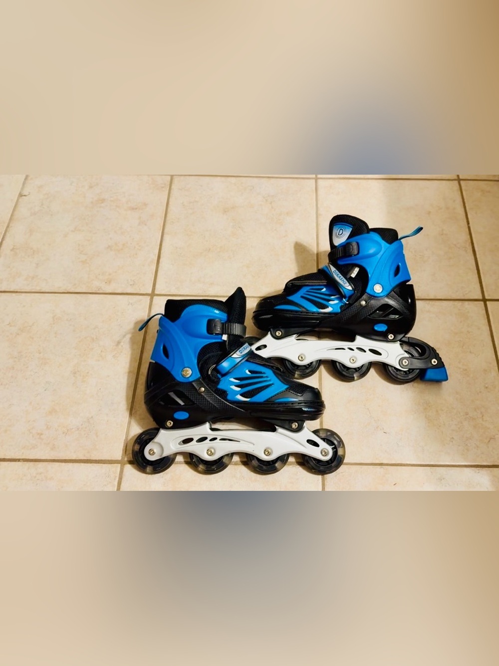 Dikashi adjustable inline skates, sz xl, blue/blk, lights in wheels, used.